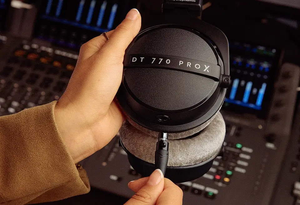 Plugging the detachable mini-XLR cable into the DT 770 PRO X